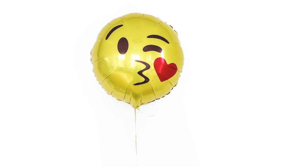 Ballong emoji med kyssemunn: Illustrasjon